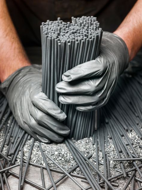 Inside One of America’s Last Pencil Factories - The New York Times    The graphite cores of pencils. Builder Aesthetic, Industrial Portrait, Warehouse Photoshoot, Factory Photography, Relief Printmaking, China City, Magazine Images, Mood Images, Corporate Photography