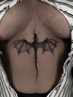 Dragon On Stomach Tattoo, Dragon Tattoo On Chest Women, Tattoo Ideas Female Back Spine Dragon, Dragon Spinal Tattoo, Sternum Dragon Tattoo, Dragon Lower Back Tattoo, Dragon Tattoo Sternum, Dragon Sternum Tattoo Women, Chest Tatoos Woman