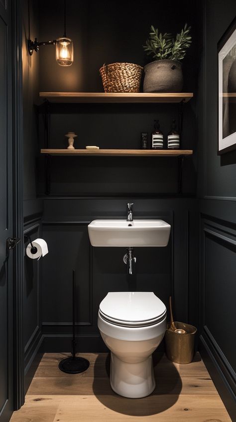 30 Brilliant Half Bathroom Decor Ideas Black Small Toilet, Downstairs Toilet Wooden Floor, Dark Small Toilet, Cozy Toilet Ideas, Black Downstairs Toilet Ideas, Black Wall Powder Room, Black Water Closet Bathroom, Utility Room With Toilet Downstairs Loo, Dark Water Closet