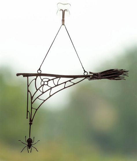 30 Halloween Window Decor Ideas for 2022 - PureWow Hanging Spider, Halloween Brooms, Traditional Halloween, Hanging Witch, Spider Web Decoration, Witches Broom, Tiffany Lamp, Adornos Halloween, Horror Decor