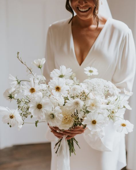 A moment for Holly and her maids. Bouquets filled with cosmos, garden roses, oregano, wild carrot, scabious, daisies. . . . Captured by @rosiemaykelly at @aswarbyrectory . . . #elderandwild #bridalbouquet #gardenstylebouquet #nottinghamflorist Rose And Poppy Bouquet, Dogwood Flower Bouquet, April Wedding Bouquet, Cosmos Bridal Bouquet, Cosmos Wedding Flowers, Cosmos Wedding Bouquet, White Spring Bouquet, Spring Bouquet Wedding, Cosmos Wedding