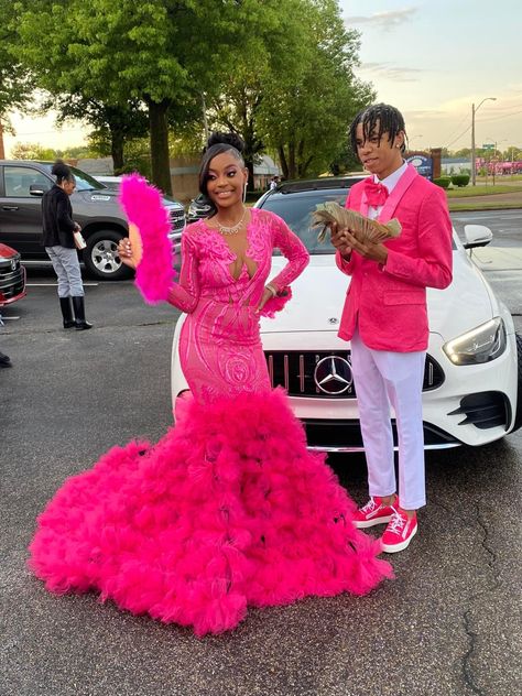 Unique Colored Prom Dresses, Blue Sneaker Ball Dresses, Prom Couples Outfits Pink, Purple Prom Dress Black Couple, Bright Pink Prom Couple, Hot Pink Prom Dress Couple Black, Pink Prom Black Couple, Prom Color Ideas, Sneaker Ball Outfit Ideas