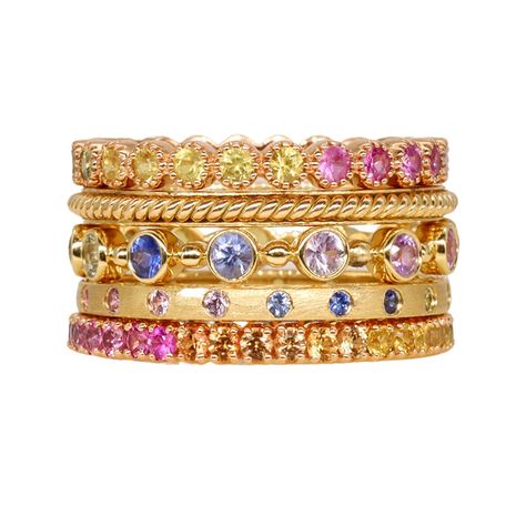 Meet Iris, the Goddess of the Rainbow. Associated with communication and new endeavors, this stack is a reminder of how a rainbow of new experiences can color an existing classic approach. We enhanced our classic and signature stacking ring styles with colorful sapphires in pink, yellow, orange, green, blue, and purple hues. This Sethi Stack includes the following styles: Rainbow Sapphire Bezel Band to highlight the range of possible opportunities with a showcase of multi-color brilliant-cut sap Bezel Band, Preppy Jewelry, Rainbow Sapphires, Ring Styles, Rainbow Rings, Rainbow Jewelry, Mom Jewelry, Bridal Bands, Purple Hues