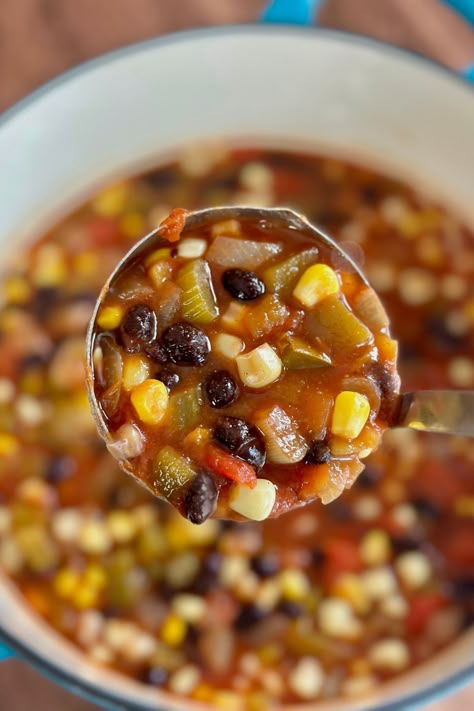 Cozy up with a bowl of Southwestern Soup! Packed full of black beans, corn, onion, pepper, celery, green chilis, and tomatoes, it's hearty, bold-flavored, and oh-so good! Black Bean Soup Panera, Black Bean And Corn Soup, Bean And Corn Soup, Soup With Black Beans, Pizza Casserole Low Carb, Southwestern Soup, Rotisserie Chicken Soup, Bean And Vegetable Soup, Green Chilis