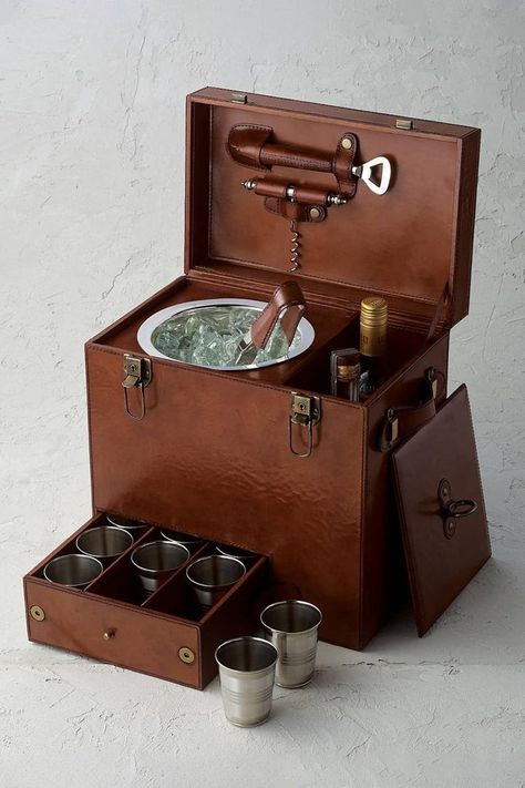 A luxurious portable bar that's perfect for traveling wine lovers, cocktail enthusiasts on the go, or just thirsty bartenders on a working vacation. Travel Bar, Portable Bar, Gin Bar, Leather Suitcase, Drinking Cups, Travel Carrier, Wine Travel, Vintage Camping, Bar Items