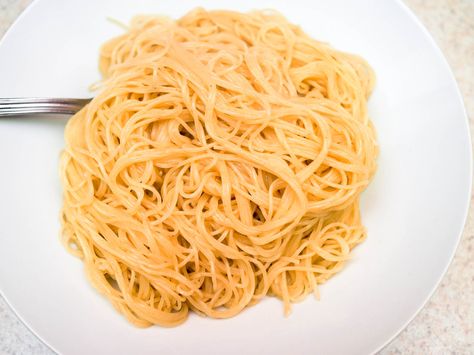 Word on the street is that you can turn any noodle into a ramen noodle by boiling it in baking-soda water. We've put the claim to the test, and now have clear instructions for how to do it—and how not to do it. We'll just tell you now, when done right, this is a homemade ramen game-changer. Spaghetti Ramen, Quick Kimchi, Homemade Ramen Noodles, Kimchi Ramen, Ramen Egg, Pasta Dough Recipes, Ramen Broth, Cooking Spaghetti, How To Make Ramen