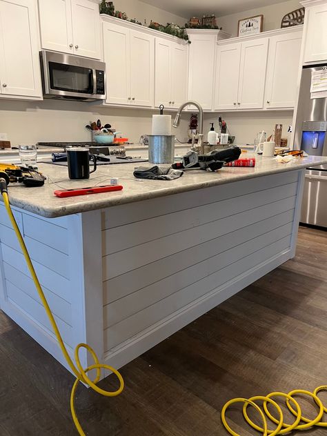 Nail the Look: DIY Shiplap Kitchen Island Tutorial & Tips. This shiplap kitchen island makeover made a huge difference in this kitchen. Not only did the shiplap look bring out the kitchen island as a centerpiece, the dark accent color added so much dimension. It's a DIY home decor idea that I'm pleased to share with you! Follow my kitchen makeover here #kitchen #kitchenmakeover #DIYmakeover #DIYkitchen #kitchenisland Shiplap Kitchen Island, Shiplap Bar, Kitchen Island Trim, Island Makeover, Remodel Hacks, Kitchen Island Makeover, Shiplap Kitchen, Kitchen Storage Hacks, Beach Kitchens