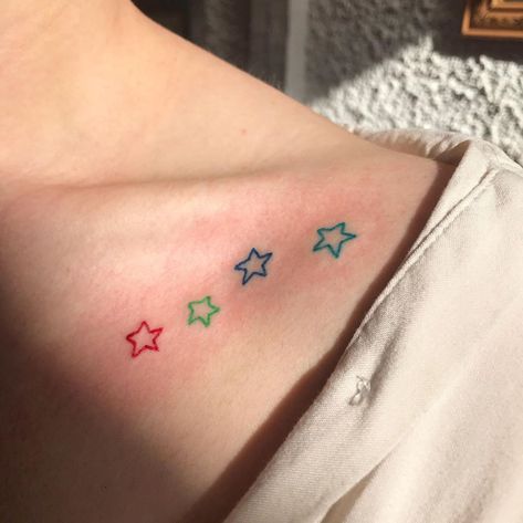 Handpoke tattooz on Instagram: “Colourful stars ✨ I loooove using my colours !! Thanks for getting this Ellie x x x . #handpokedtattoo #handpoke #bristoltattoo…” Colour Star Tattoo, Bright Star Tattoo, Colourful Star Tattoo, Small Colored Stars Tattoo, Pastel Star Tattoo, Colorful Star Tattoos, Cross Tattoos, Cross Tattoos For Women, Star Tattoo