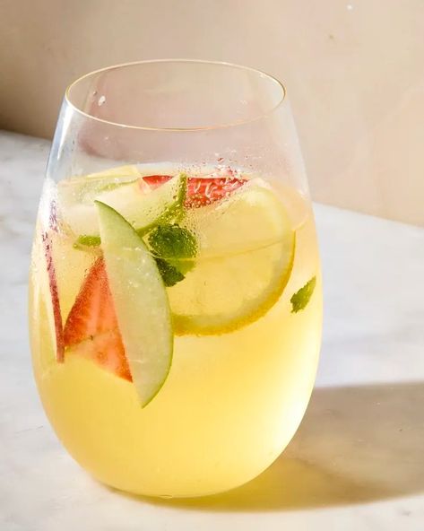 White Sangria Recipe (Our Best Ever!) | The Kitchn Easy White Sangria, Christmas Margaritas, Strawberry Basil Margarita, White Sangria Recipe, White Wine Sangria, Salmon Potato, White Sangria, Sangria Recipe, Lunch Appetizers