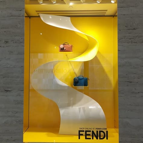 FENDI, Sowwah Square, Abu Dhabi, United Arab Emirates, "Hit Summer with a Swirl", creative by Sign Works, pinned by Ton van der Veer Fashion Window Display Ideas Creative, Apple Window Display, Fendi Display, Window Display Design Creative, Autumn Window Display, Grey Floral Wallpaper, Fashion Window Display, Luxury Windows, Window Display Design