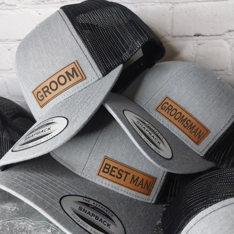 Custom wedding party hats for the perfect wedding pictures! Corner patch on our Premium Mid-Profile Snapback Trucker Hats. You can choose GROOM, FATHER of the BRIDE, BRIDE, GROOMSMEN, BEST MAN, GROOMSMAN, etc. or message us for custom requests. We custom make each patch in Branson Missouri U.S.A. We are here to make your wedding day spectacular! HOW TO ORDER - 1. Select your design. SAVE THE DATE - GROOM - BRIDE - BEST MAN - GROOMSMAN - FATHER OF THE BRIDE etc. You can also message us with special requests. Examples: Names, Bride, Bridesmaid, Nicknames, etc. 2. Select your hat color.  3. You can change quantities in your shopping cart   Message us ANYTIME with ANY special requests. We are here for you. FOR BULK ORDER DISCOUNTS 6 HATS - 10% OFF Use Discount Code - BULK10 12 HATS - 15% OFF U Simple Mens Wedding Attire, Groomsmen With Ball Caps, Men’s Rustic Wedding Attire, Wedding Hats For Groomsmen, Carhartt Wedding Groomsmen, Groomsmen Hats Wedding, Grooms Wearing Hats, Groomsmen Hats Baseball, Country Biker Wedding