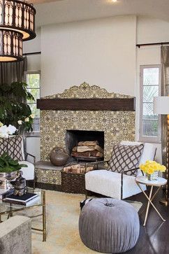 Traditional hand painted tile fireplace with rustic wood mantel. The modern furnishings blend the space with form and lines. Modern Spanish Fireplace, Spanish Fireplace Ideas, Black Mantle Decor, Mexican Fireplace, Spanish Style Fireplace, Mediterranean Fireplace, Spanish Fireplace, Living Design Ideas, Black Mantle