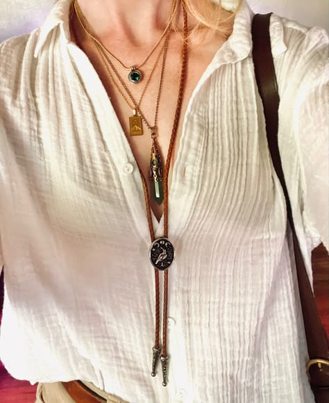 Layered necklaces with crystal & bolo tie gold jewelry Women’s Bolo Tie, How To Style Bolo Tie, Women’s Bolo Tie Fashion, How To Style A Bolo Tie Women, Styling Bolo Tie Women, Bolo Outfits Women, Women Bolo Tie, Women Bolo Tie Outfit, Bolo Tie Women Outfit