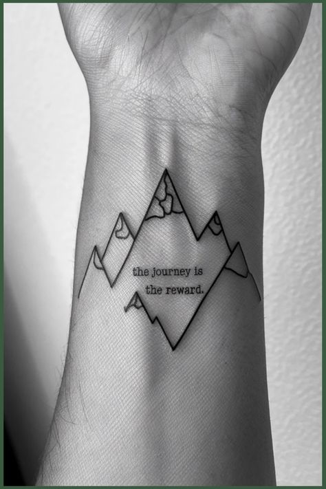 Wrist tattoo of mountain outlines with the text "the journey is the reward". Mountain Tattoos With Quotes, Mountain Range Tattoo, Wrist Tattoo Ideas, Mountain Silhouette, Tattoo Ideas For Women, Wrist Tattoos For Women, Tattoo Bracelet, Mountain Ranges, Power Of Nature