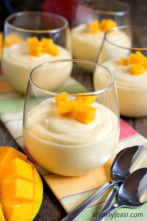 This light and creamy Mango Yogurt Mousse is a taste of the tropics! Elegant for a special meal but easy enough to serve any day of the week! Yogurt Mousse Recipe, Yogurt Mousse, Mango Yogurt, Mango Mousse, Chocolate Peanut Butter Pie, Mango Dessert, Mousse Dessert, Dessert Aux Fruits, Peanut Butter Desserts