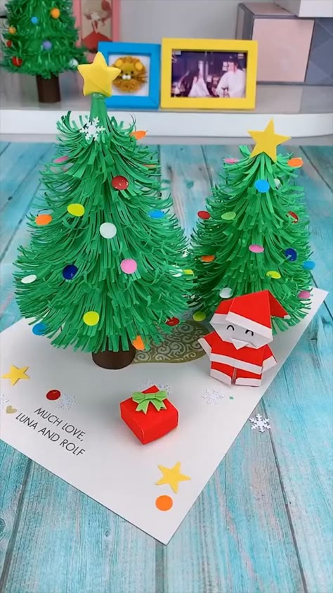 Christmas Tree Recycle Ideas, Christmas Tree Children Craft, Christmas Decor Ideas For Children, Christmas Tree Ideas Paper Crafts, Christmas Tree Made Of Paper, Diy Recycled Christmas Decorations, Paper Craft Christmas Tree, Construction Paper Christmas Decorations, How To Make A Paper Christmas Tree