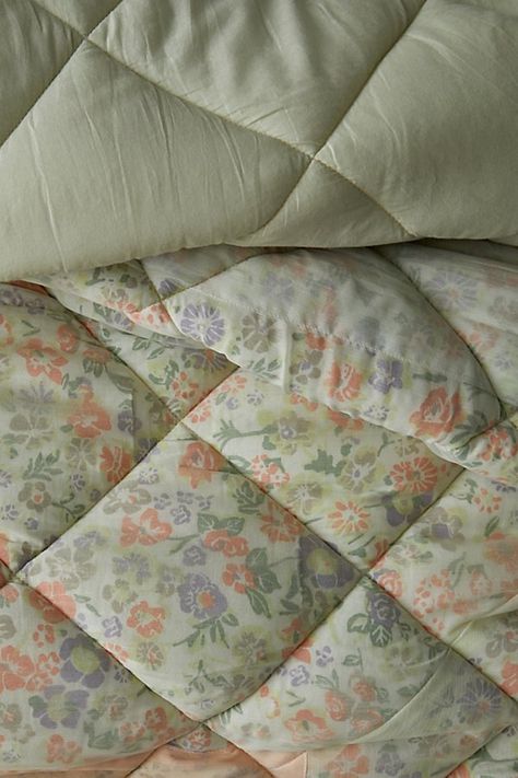 Add a whimsical layer to your bed with the Ingrid Chiffon Floral Quilt. Made in a soft cotton blend, this floral quilt features ditsy florals printed allover in warm, vibrant hues. Finished with quilted stitching allover for an elevated look. Available exclusively at Urban Outfitters. Features Ingrid Chiffon Floral Quilt from UO Home -The softest quilt with layers of sheer chiffon Finished with retro ditsy florals allover with quilted stitching Reversible - flip it to create your own unique look Bed With Quilt, Floral Quilt Bedding, Boston House, Dallas Apartment, Pinterest Room, Quilted Bedding, Floral Comforter Sets, Floral Bedroom, Floral Comforter