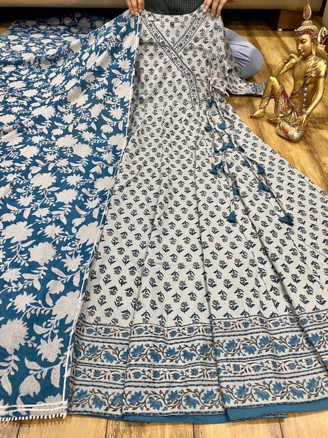 NP Angrakha Kurti Premium cotton angrakha gown with beautiful Block print & tassels . With Dupatta all liquid Zari Size - 38/ 40/ 42/ 44 INR 1925/- +shipping #alankritaweboutique #epitomeofgrace #eleganceinethnics #womenwithclass #couture Order On 8898889404 Angrakha Gown, Black Velvet Blouse Design, Angrakha Kurti, Desinger Dresses, Printed Kurti Designs, South African Traditional Dresses, White Anarkali, Long Blouse Designs, Sharara Designs