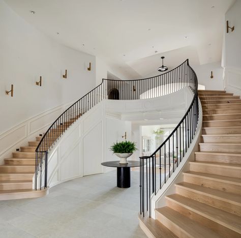 NEWPORT COAST Bridal Staircase, Brooke Wagner Design, Brooke Wagner, Wrought Iron Handrail, Iron Handrails, Staircase Design Modern, White Wainscoting, Double Staircase, Entry Stairs