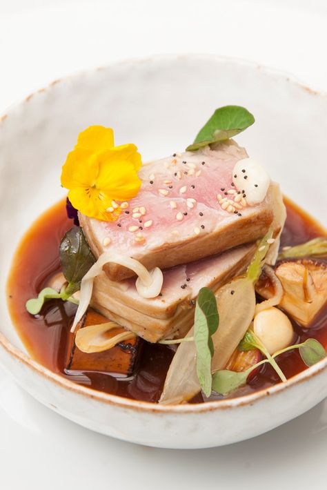 A stunning seared tuna recipe by Aaron Patterson, this Japanese main course pairs marinated tofu with tuna and mixed mushrooms. Tuna Sisig, Sizzling Tofu, Seared Tuna Recipe, Recipe With Tofu, Century Tuna, Recipe Tofu, French Breakfast Radish, Miso Recipe, Miso Broth