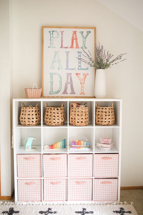 Neutral Pastel Playroom, Ikea Bookshelf Playroom, Playroom Cubby Storage, Toy Room With Couch, Toy Room Cube Storage, Decluttered Playroom, How To Organize Playroom, Girls Room Toy Storage, Playroom Cube Storage