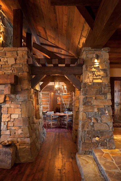 Gorgeous massive stone columns line the hallway. Log Cabin Interior Design, Prairie Style Architecture, Cabin Interior Design, Log Cabin Interior, Mountains Travel, Vacation Cabin, Adventure Hiking, Rustic Retreat, Cabin Living