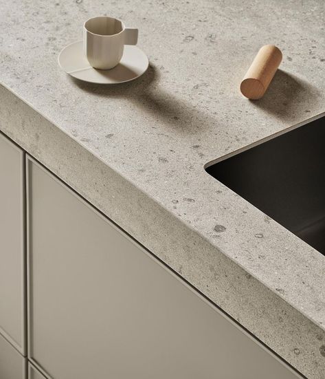 Close-up details of ceramic white kitchen island countertop with an espresso cup and a wine cork. 30s Kitchen, Terrazzo Kitchen, Traditional Meets Modern, House Organisation, Minimalist Kitchen Design, Art Decor Diy, Kitchen Corner, Home Design Plan, Scandinavian Kitchen