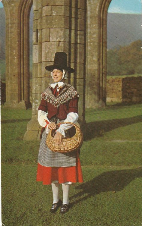 A more standard Welsh costume. Shorter dress, smaller apron and shawl. p1969 Traditional Welsh Dress, Welsh Tattoo, Sacred Twenty Eight, Welsh Lady, Costumes Around The World, Welsh Dragon, Celtic Culture, National Dress, Period Costumes