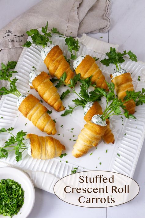 Stuffed Crescent Roll Carrots on a white serving platter with a dish of chopped parsley next to it. Stuffed Crescent Roll Carrots, Crescent Roll Carrots, Easter Finger Food, Crossiant Recipes, Spring Appetizer, Crescent Bake, Croissant Roll, Spring Appetizers, Easter Food Appetizers