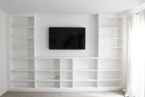 Complete a wall of built-ins on a budget by turning a set of IKEA Billy bookcases into a DIY set of built -ins. This is an IKEA hack you will want to see. https://www.arinsolangeathome.com #ikeahack #builtin Billy Ikea, Ikea Built In, Billy Bookcase Hack, Ikea Billy Bookcase Hack, Ikea Living Room, Ikea Billy Bookcase, Ikea Billy, Billy Bookcase, Workspace Inspiration