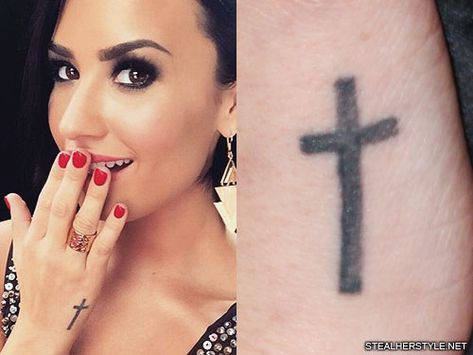 Demi Lovato Cross Side of Hand Tattoo | Steal Her Style Demi Lovato Hand Tattoo, Demi Lovato Tattoos, Pretty Cross Tattoo, Black Cross Tattoos, Cross Tattoo On Hand, Small Cross Tattoos, Tattoo 2017, Side Hand Tattoos, Love Symbol Tattoos