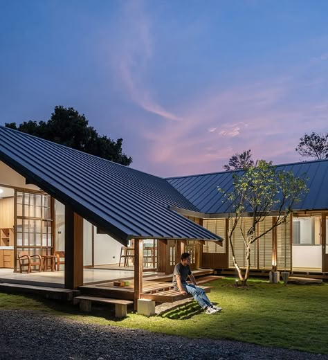 housescape design lab renovates 60-year-old wooden house in thailand Asian House Design, House In Thailand, Concrete Siding, Modern Tropical House, Asian House, Tropical House Design, Metal Siding, Weekend House, Vernacular Architecture