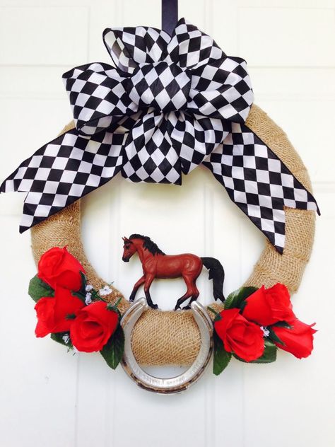 The derby wreath I made! The horseshoe is one that was actually used at Churchill downs. Kentucky Derby Games, Derby Wreath, Derby Decor, Kentucky Derby Decorations, Kentucky Derby Theme, Kentucky Derby Themed Party, Derby Party Food, Themed Wreaths, Kentucky Derby Party Decorations