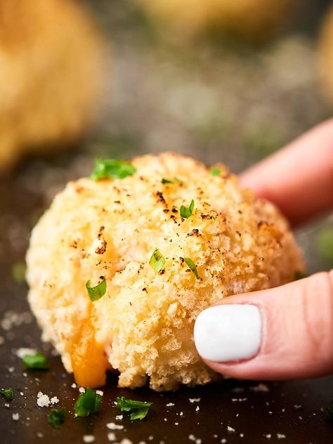 #ad These Loaded Baked Potato Croquettes are full of fluffy Idahoan Signature™ Russets Mashed Potatoes, gooey cheese, salty bacon, and coated with crispy panko. A surprisingly easy, yet impressive appetizer for any occasion! showmetheyummy.com Made in partnership w/ @idahoanfoods Baked Potato Croquettes, Potato Croquettes Recipe, Baked Potato Bites, Potato Croquette, Sour Cream Dipping Sauce, Easy Thanksgiving Appetizers, Potato Croquette Recipe, Oven Baked Potato, Thanksgiving Appetizers Easy