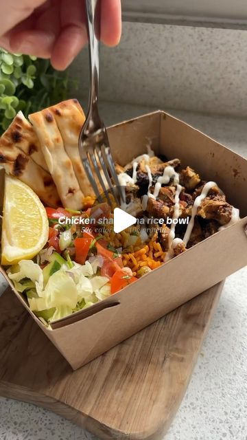 Christina Kynigos on Instagram: "30 DAYS OF HEALTHY AIR-FRYER RECIPES Day 23| Chicken Shawarma rice bowls 🥵   The easiest shawarma your ever going to make, tastes absolutely banging, served with spiced rice, mixed salad, flatbread AND a good drizzle of garlic & herb sauce 😮‍💨   Macros 596 calories 40gP / 26gF / 45gC Serves: 2   Shopping list ✍️ - 370g boneless chicken thighs - 100g shawarma paste (I used Belazu) - 30g flatbread, sliced - 80g Iceberg Lettuce, sliced - 10 cherry tomatoes, finely diced - 1 sprigs coriander, finely diced - 1 slice red onion, finely diced - 1 Inch cucumber, finely diced - 200g shop-bought mexican rice, - Lemon, quartered Optional: Garlic & herb sauce Method Mix the salad ingredients together and set aside. Marinade the chicken thighs in the shawar Shawarma Rice Bowl, Chicken Shawarma Rice, Shawarma Rice, Garlic Herb Sauce, Rice Lemon, Mixed Salad, Spiced Rice, Rice Bowls Recipes, Herb Sauce