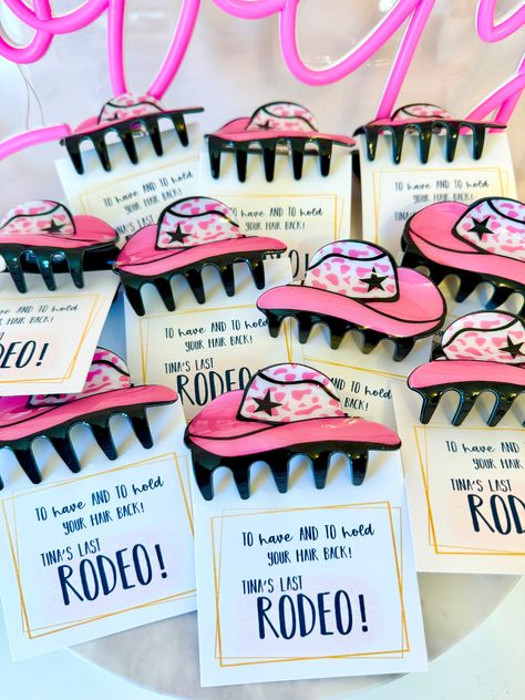 Bachelorette Party gift favor! I can personalize the cards to say anything you would like! Leave a message at check out with information.With your purchase you receive:1 Personalized CardPink Cowgirl Hat Claw Clip (acrylic)THE LOVE LEIGH GIFT PROMISE: Our goal is to hand make you a one of a kind memorable gift! We love what we do and want to share the love! Nashville Bachelorette Party Gifts, Pink Cowgirl Bridal Shower Ideas, Bachelorette Party Ideas Cowgirl, Bachelorette Party Cowgirl Theme, Bachelorette Party Ideas Country Western Theme, Ranch Bachelorette, Bridesmaid Proposal Cowgirl, Western Bachelorette Gift Bags, Bachelorette Beach Party Ideas