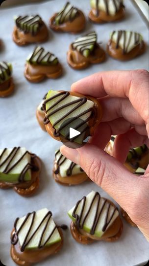 5.1K views · 573 reactions | Caramel Apple Pretzel Bites 🍏🥨 The easiest 4-ingredient back to school snack! 

Here’s how to make them: 

Arrange Essential Everyday mini pretzels on a baking sheet lined with parchment paper. 

Place a caramel square on top of each pretzel. 

Bake at 350˚F for 3-4 minutes (just long enough for the caramel to soften. Don’t go any longer than 5 minutes). 

Immediately top with an apple slice. To keep the apples from browning, toss in lemon juice, then pat dry with paper towel. 

Drizzle Essential Everyday melted semisweet chocolate chips on top, then refrigerate for 10 minutes, or until the chocolate is set. Enjoy! | Essential Everyday | essential_everyday · Original audio Apple Carmel Pretzel Bites, Caramel Apple Pretzel Bites, Carmel Apple Pretzel Bites, Kiddie Treats, Pretzel Chocolate Bites, Apple Pretzels, Mini Instagram, Apple Bites, Caramel Bites