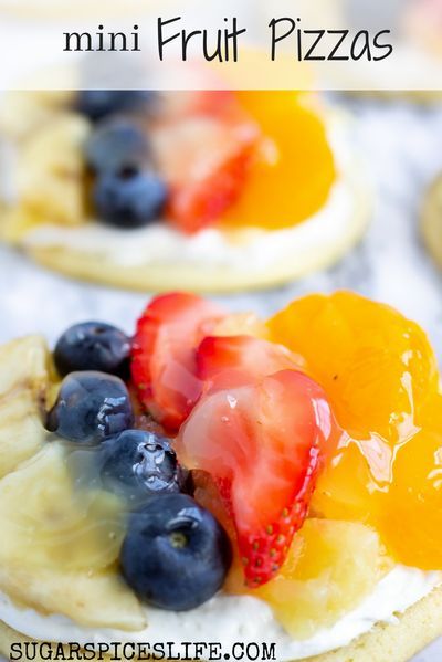 Mini Fruit Pizza: Individual sized fruit pizzas! Sugar cookie base with a cream cheese topping, fresh fruit, and a sweet glaze! Fruit Pizza Recipe With Glaze, Mini Fruit Pizza, Fruit Pizza Icing, Cool Whip Topping, Dessert Bars Recipes, Cream Cheese And Cool Whip, Fruit Pizza Frosting, Fruit Pizza Bar, Fruit Pizza Designs