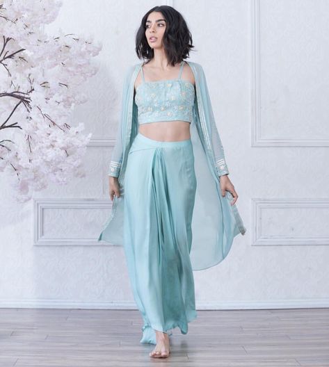 Long sleeves sheer cape paired with a dhoti skirt and crop top, can you say Summer? The INAYAH outfit 💫 . . . #kynah #kynahgirl #lengha… Dhoti Dress For Women Wedding, Dhoti Dresses For Women, Skirt And Crop Top Indian, Dhoti Skirt, Sheer Cape, Skirt And Crop Top, Haldi Outfits, Wedding Lookbook, Top Indian