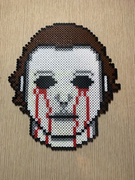 #halloween #michaelmyers #perlerbeads Michael Myers Perler Bead Patterns, Vampire Diaries Perler Beads, Micheal Myers Perler Bead, Michael Myers Pixel Art Grid, Michael Myers Perler Beads, Nes Pixel Art, Chucky Perler Beads, Ghostface Perler Beads, Horror Perler Beads