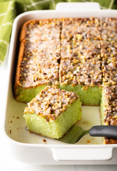 Easy Pistachio Poke Cake Recipe + VIDEO | A Spicy Perspective Pistachio Poke Cake, Pistachio Pudding Cake, Pistachio Cake Recipe, Homemade Vanilla Cake, Pudding Poke Cake, Poke Cake Recipe, Pistachio Recipes, A Spicy Perspective, Holiday Sweets