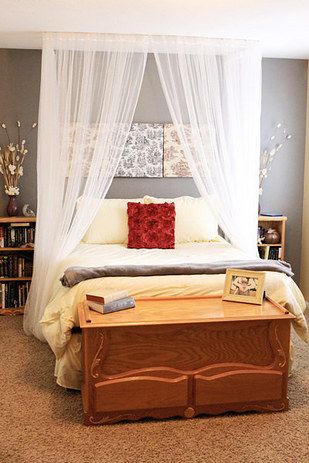 DIY a cozy canopy by hanging fabric from the ceiling. | 17 Ways To Make Your Bed The Coziest Place On Earth Curtain Over Bed, Canopy Bed Diy, Canopy Bedroom, Diy Canopy, Room Photo, Decor Ikea, Christmas Outdoor, Luxurious Bedroom, Romantic Bedroom