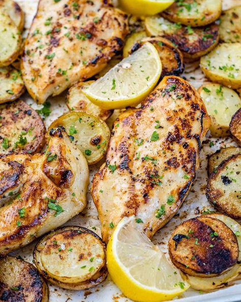 close up honey lemon chicken breast on a sheet pan with potatoes and lemon wedges Pounded Chicken Breast Recipes, Chicken Breast And Potatoes, Lemon Chicken Breast, Baked Lemon Chicken Breast, Lemon Chicken And Potatoes, Juicy Chicken Breast Recipes, Healthy Lemon Chicken, Chicken Potato Bake, Chicken Head