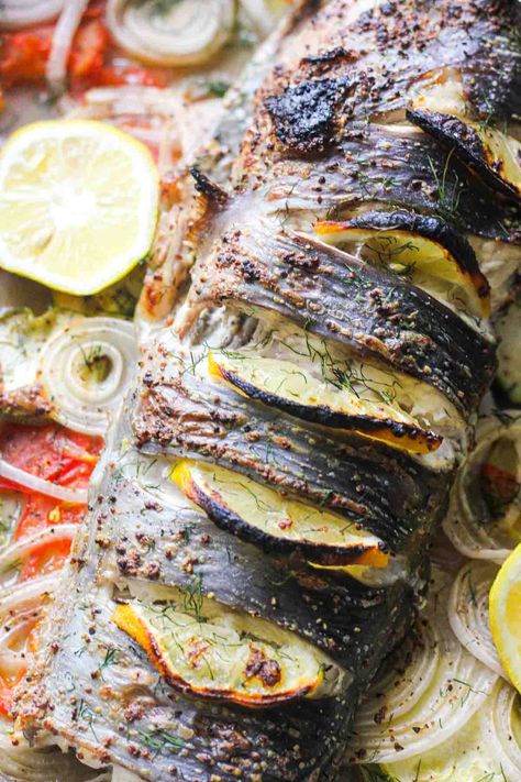 baked whole catfish with lemon slices Baked Catfish Recipes Oven Foil, Healthy Catfish Recipes, Baked Catfish Recipes, Baked Whole Fish, Grilled Catfish, Baked Catfish, Whole Fish Recipes, Fish Stew Recipes, Seafood Dinner Recipes