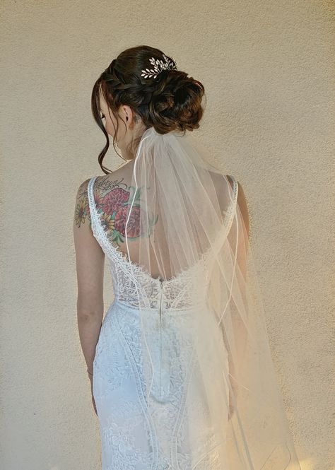 Romantic low bun with veil underneath by The Art of Ash Wedding Veils With Hair Up Messy Buns, Bridal Hair With Veil Underneath, Veil Underneath Bun, Brunette Wedding Updo With Veil, Vail Underneath Bun, Wedding Veil Under Hair, Open Back Wedding Dress With Veil, Wedding Updo Veil Underneath, Low Bun With Veil Underneath