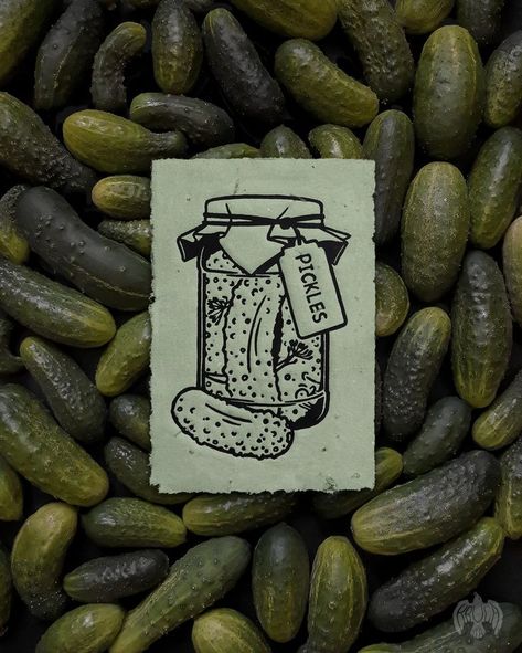 Small linocut "Pickles", garden vegetable illustration for kitchen, jar of cucumbers poster for food lover, dining room decorative art print

Grapic design ideal for every mom, food lover, gardener and chef.

Slightly green color of paper and illustration theme will match interior design of cozy dining room and kitchen atmosphere full of vegetables and spices.

Linocut carefully hand printed on homemade paper with deckled edges. Tinted with subtle green ink and additional fused plant fragments. Small Linocut, Illustration Theme, Cozy Dining Room, Kitchen Jar, Homemade Paper, Chibi Body, Vegetable Illustration, Garden Vegetable, Handmade Stamps