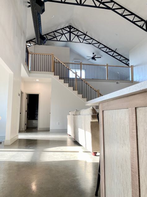 Our DIY Barndominium Part 15: Final Reveal! Loft Barndominium Floor Plan, Concrete Barndominium, Barndominium Vaulted Ceiling, Concrete Floor Barndominium, Black Metal Barndominium, Concrete Floors Barndominium, Barndominium Stairs, Loft Barndominium, Barndominium Loft