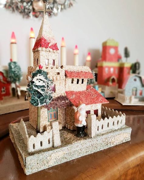 Leben Riebe on Instagram: "Love this old putz church. I didn't have the space to set up my 1930's putz village this year but I still got out some of my favorite buildings. I love the large bisque Santa standing guard over this one. Makes me sad just thinking all this will have to be packed away soon 😭. - #vintageholiday #vintagechristmas #retrochristmas #vintagedecor #putzhouse #putzvillage #christmaschurch #christmasvillage #santaclaus #hollyjolly #antiquechristmas #vintageSanta #vintagefinds Putz Village, Christmas Church, Putz Houses, Antique Christmas, Christmas Fashion, Vintage Holiday, Christmas Village, Vintage Santas, Holly Jolly