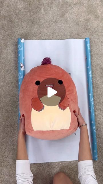 LENNIA (Folding Queen 👑) on Instagram: "How to gift wrap an oversized squishmallow (20 inches) #wrappinghack #wrappingpresents #giftwrapping" Helpful Hacks, How To Wrap, Present Wrapping, December 19, Gift Wrap, Helpful Hints, Gift Wrapping, Audio, Queen