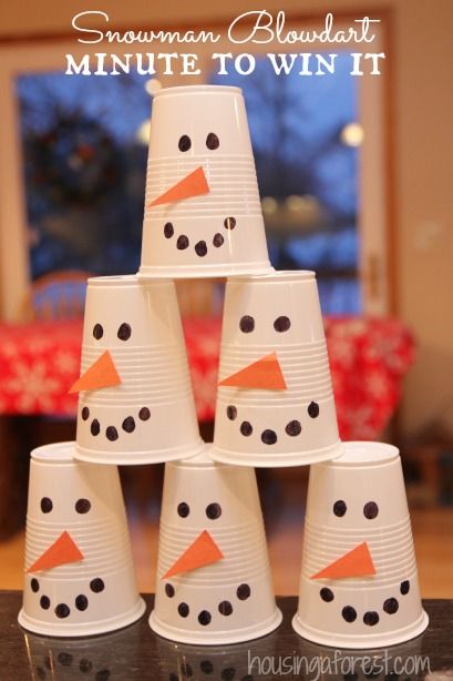 Winter Fun ~ Snowman Blowdart Minute to Win it Game Our family loves Minute to Win it Games!  They are great for a simple family night or a large crowd.  Plus you probably can use things you already have around the house.  Love that! The Challenge: To blow the snowman cup stack off table using Party Games For Families, Schnee Party, Family Christmas Party Games, Games For Families, Fun Christmas Party Ideas, Family Gift Exchange, Christmas Party Games For Kids, School Christmas Party, Snowman Party